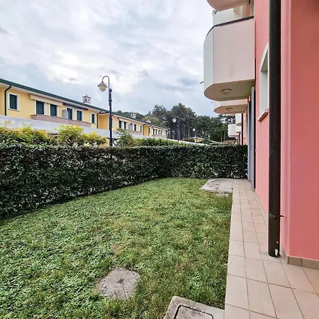 Garden With Pool In Village Bibione